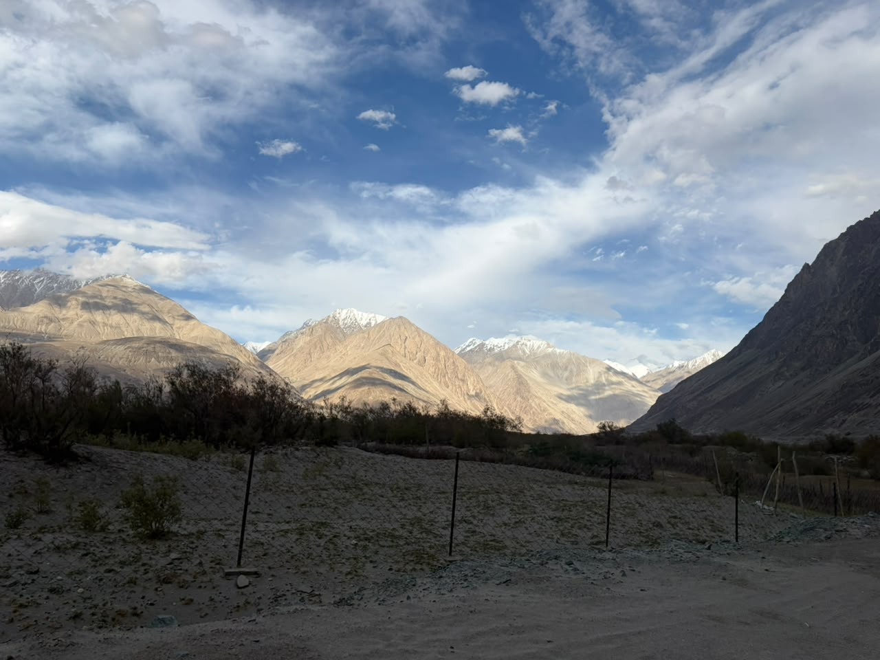 Nubra Valley landscape with bare mountains and open ground in Ladakh